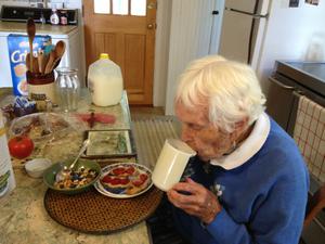 image Sipping warmed milk at breakfast August 2014.jpg 